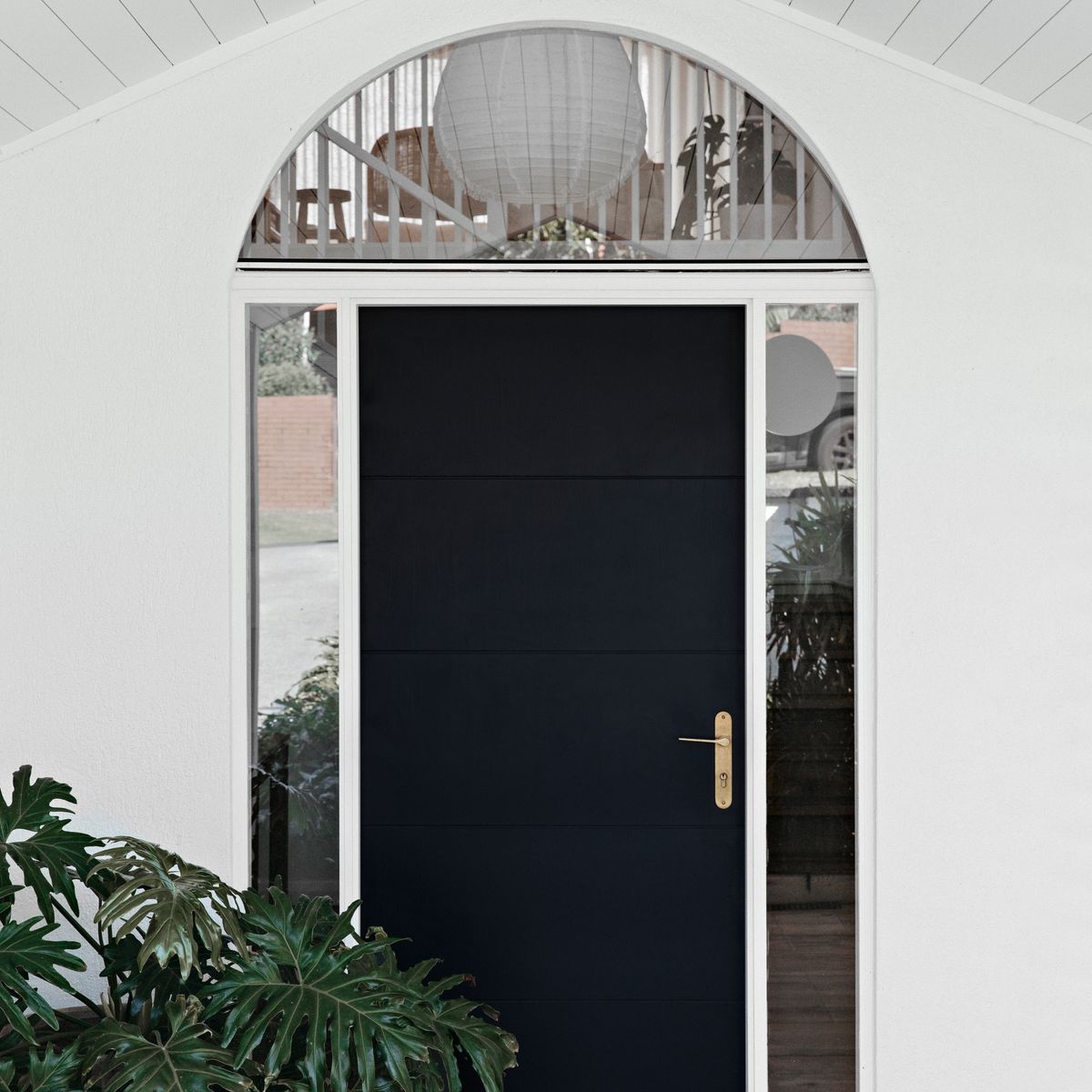 15270E85 - Como Lever - Oval Backplate - Brushed Brass - Entrance