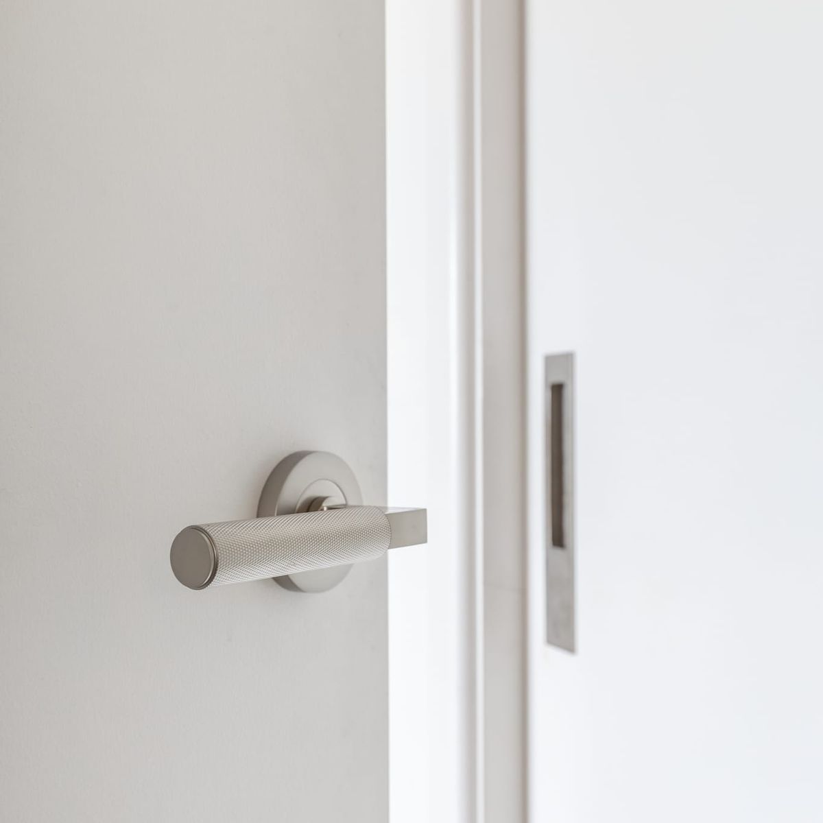 0359 - Brunswick Lever - Round Rose - Satin Nickel - Passage