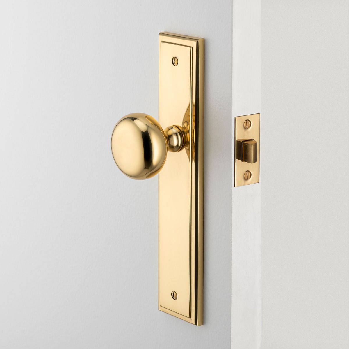 10340 - Cambridge Knob - Stepped Backplate - Polished Brass - Passage