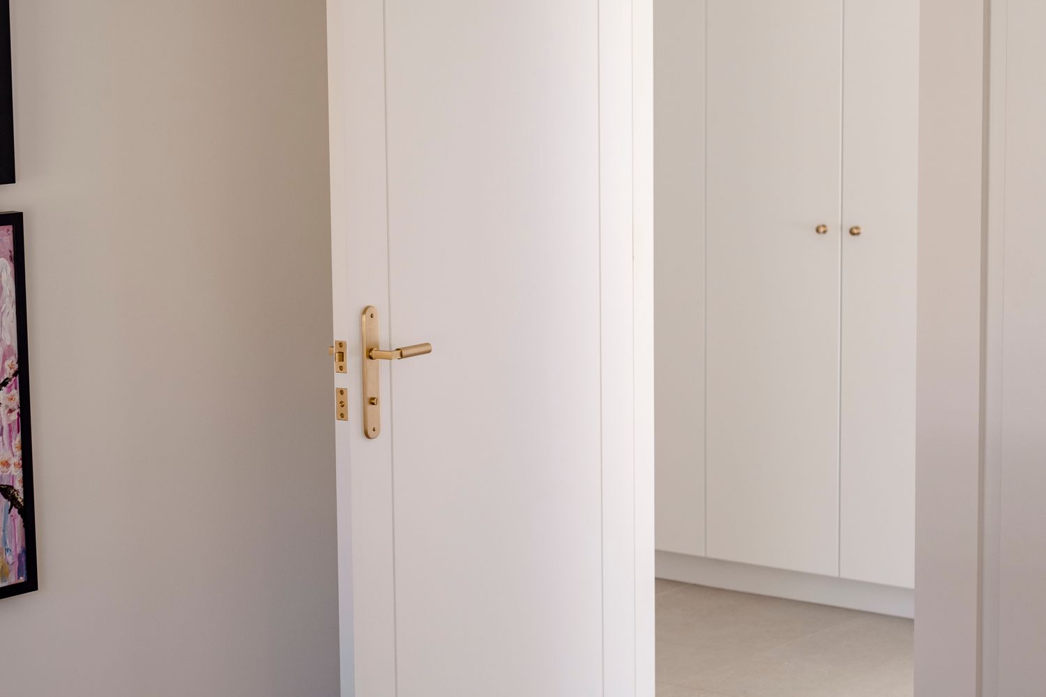 10766E85 - Berlin Lever - Oval Backplate - Signature Brass - Entrance