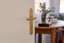 15266P85 - Berlin Lever - Oval Backplate - Brushed Brass - Privacy