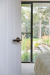 0351 - Brunswick Lever - Round Rose - Signature Brass - Passage