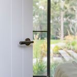 0351 - Brunswick Lever - Round Rose - Signature Brass - Passage